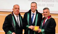 Latif Cem Baran'a 25. yıl plaketi