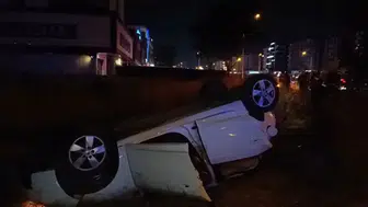 Otomobil araziye savrulup takla attı