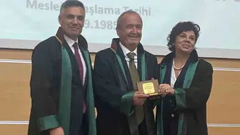 METİN TEVFİK BUĞDAYCI'YA 40. ONUR YILI PLAKETİ