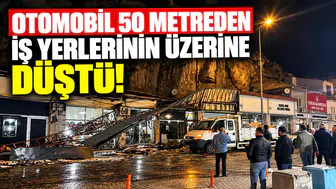 Otomobil 50 metreden iş yerlerinin üzerine düştü