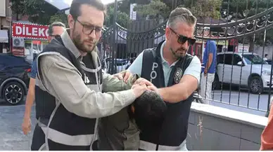 Eşini sokak ortasında darbeden şüpheli adliyede